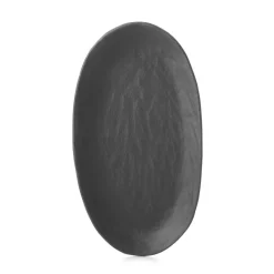 Assiette coupe plate ovale Noir brut porcelaine culinaire 24,5x13,5 cm Yli - REVOL Hot