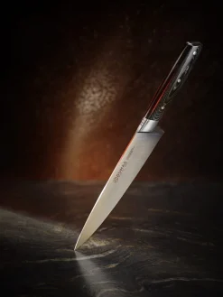 32 DUMAS Couteau chef 20 cm inox plastique unie Signature Micarta