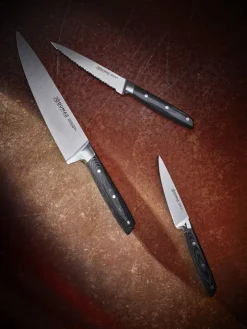 32 DUMAS Couteau chef 20 cm inox plastique unie Signature Micarta